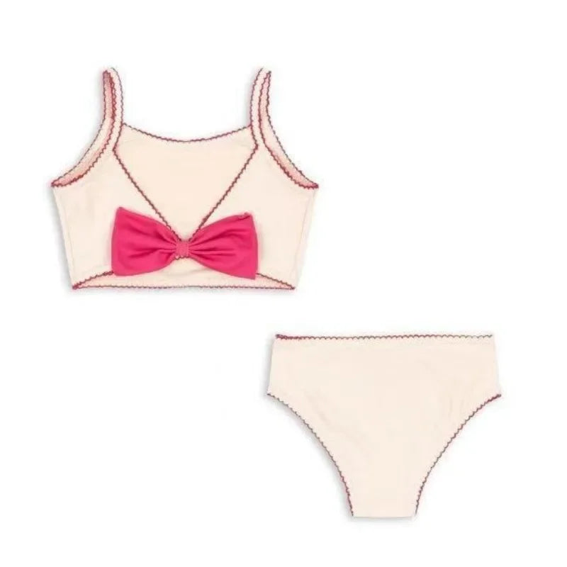 Light girls' swimsuit - stripe long-sleeve, bow accent, nylon, for summer beach days
