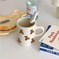 Ceramic Mug Cream Teddy Bear Print Coffee Cup With Handle Korean Cute Breakfast Mug Fall 2025 Cute Gift Simple Grip