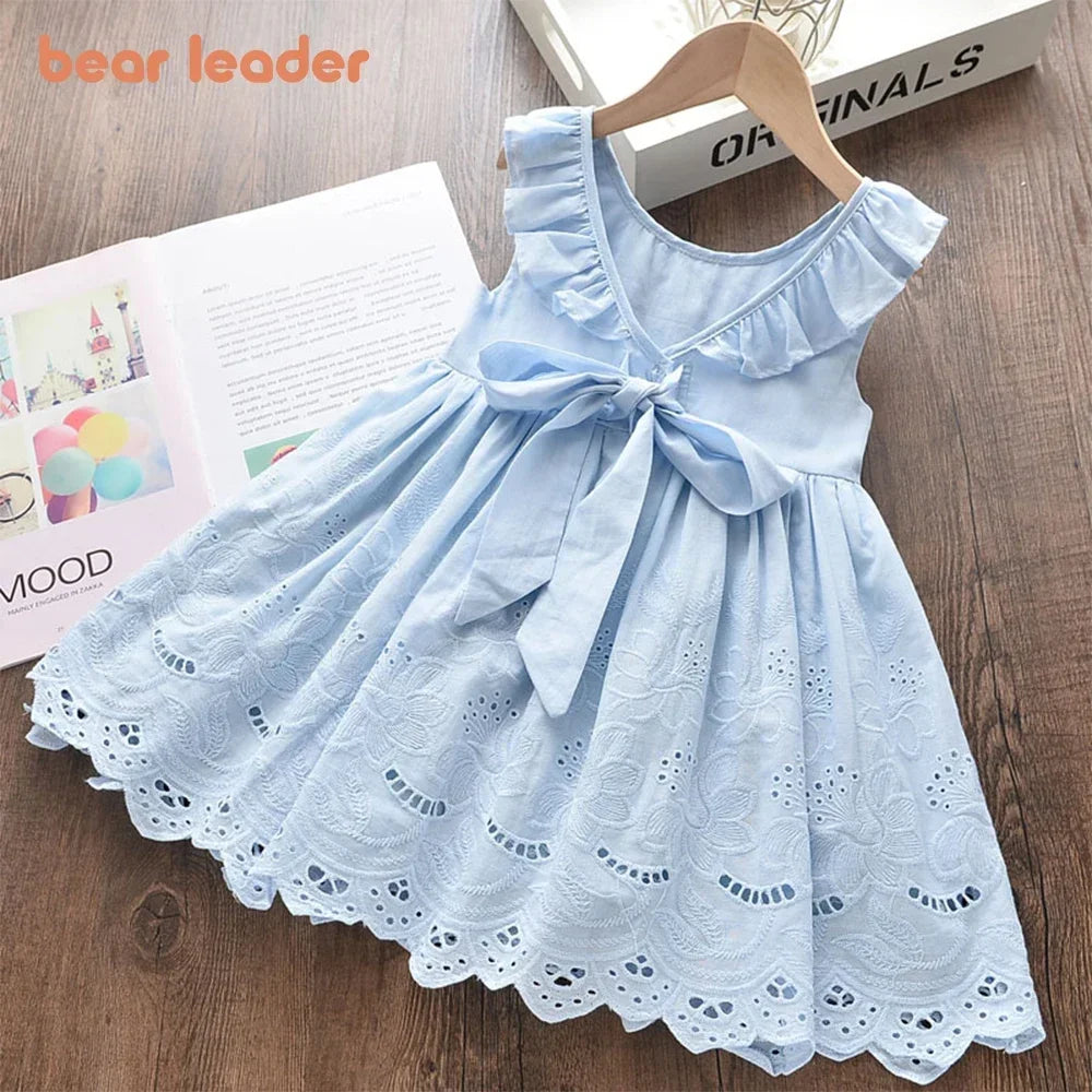 Light and flattering girls' dress - bow-front, cotton eyelet fabric, party wear